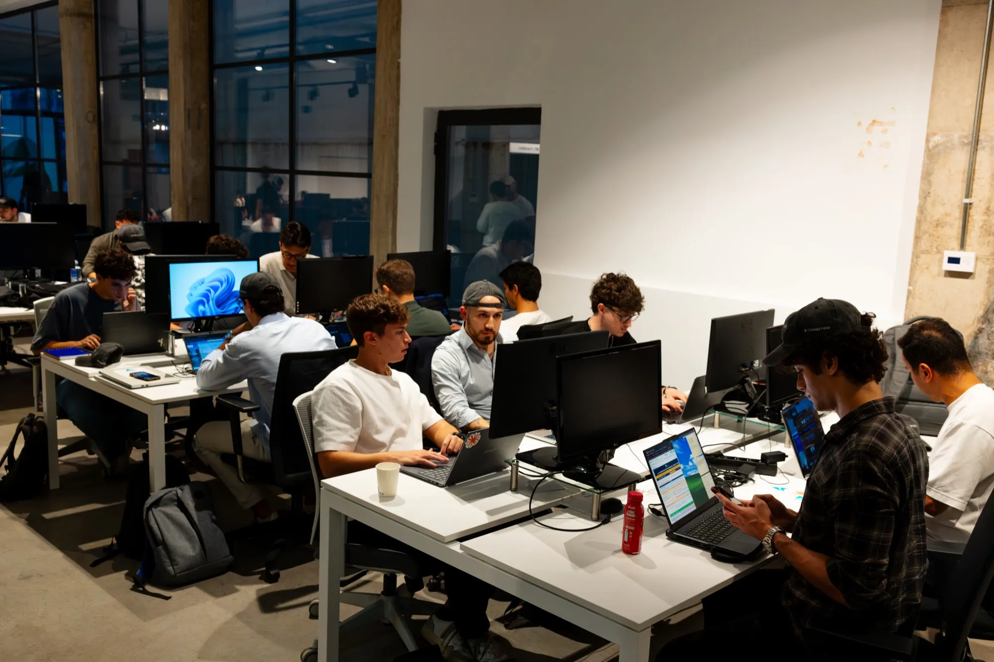 The hackathon room on Friday afternoon, with the teams at work